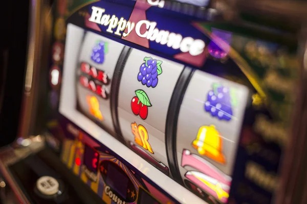 Boom City slot game interface on two-hundred-twenty-six showing reels, stake selector, and account balance
